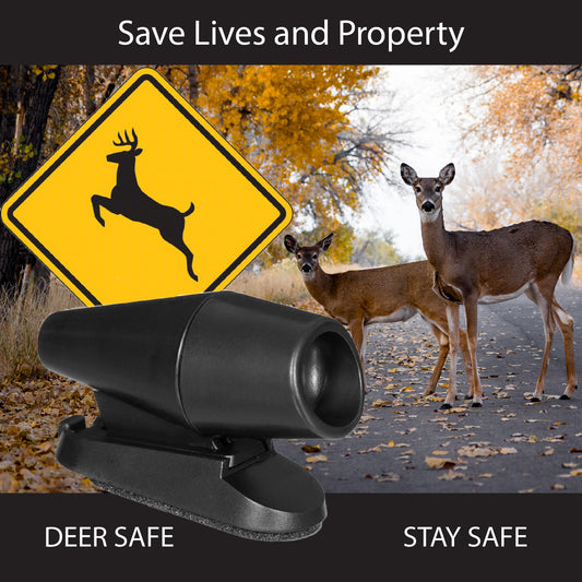 Two deer on road with fall colors and deer crossing sign, deer whistle in foreground 'Save Lives and Property'